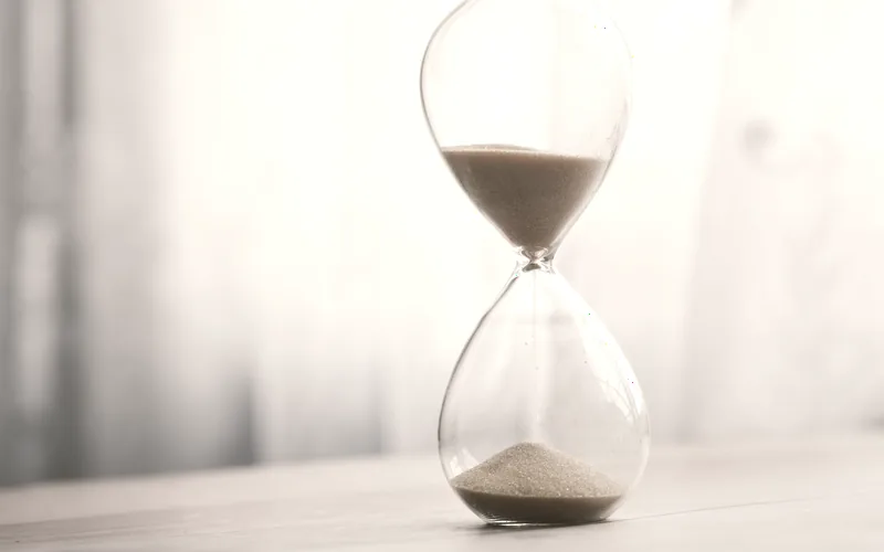 An hourglass with sand running through it